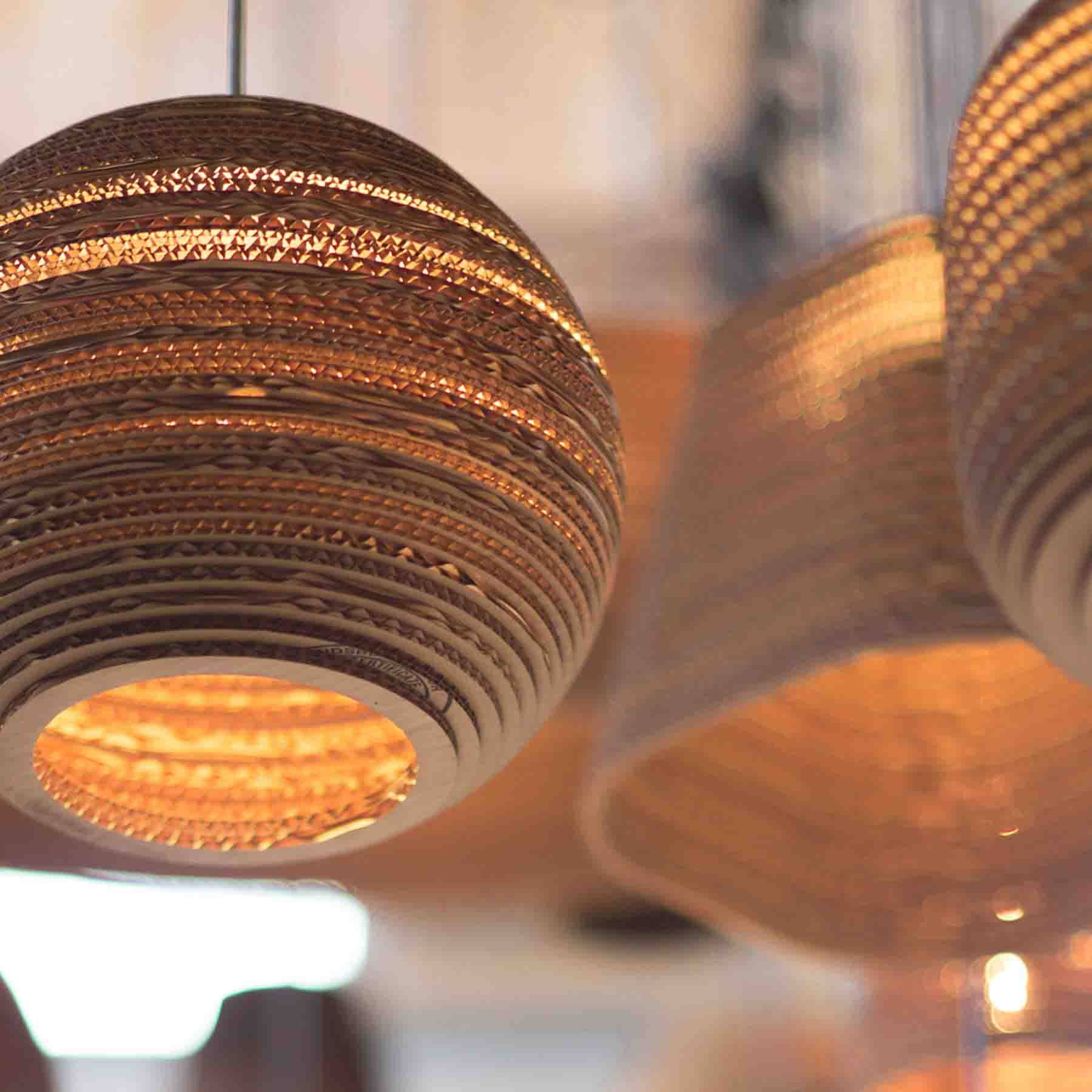 explore a diverse range of materials for the perfect pendant light