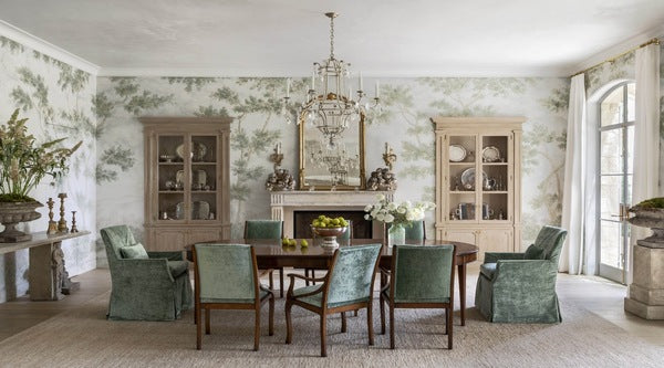 green chairs add vibrancy to the dining room