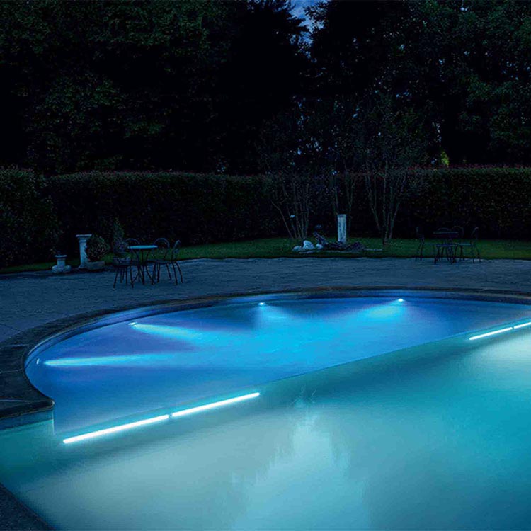 illuminating the swimming pool lends a soft and mystical glow to the surroundings