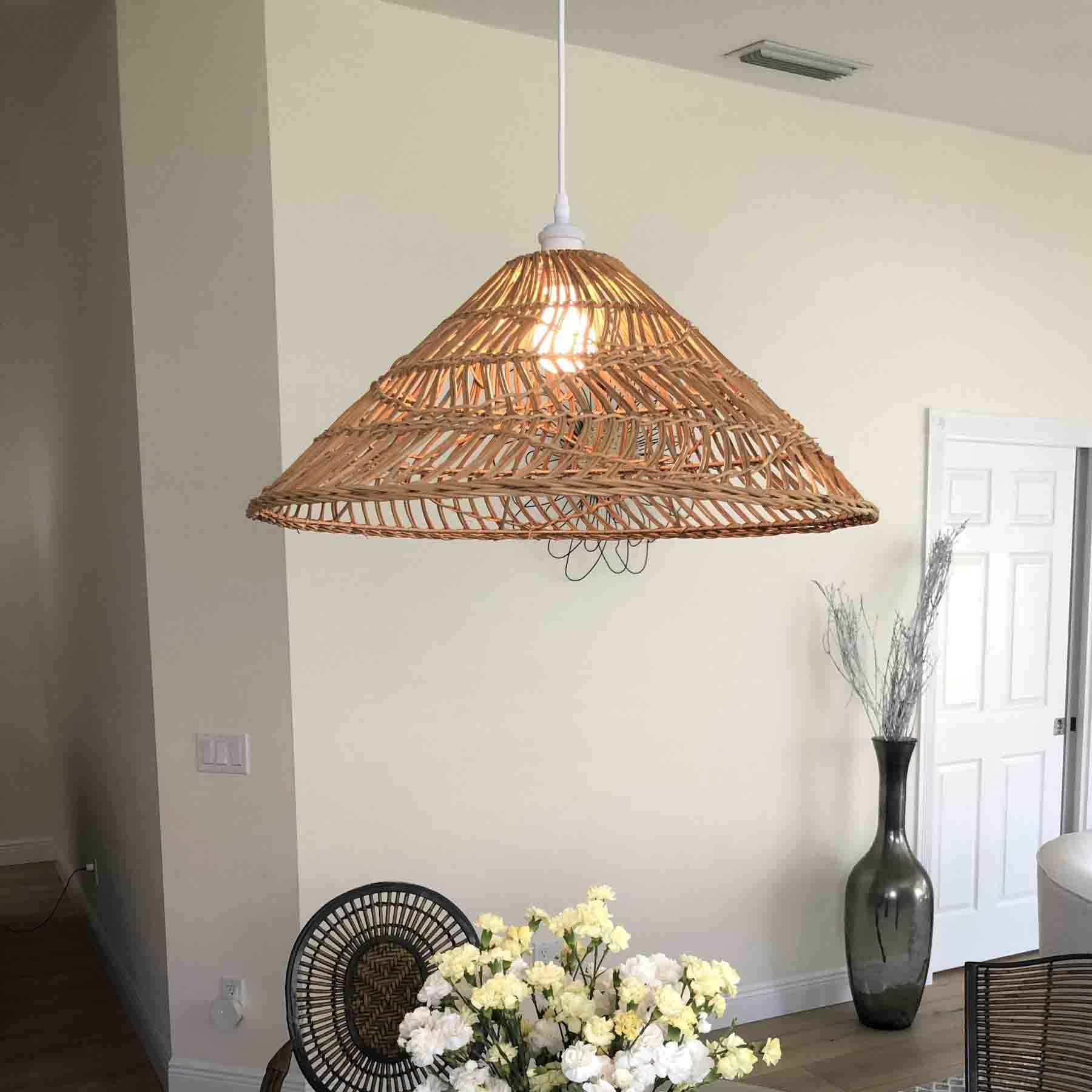maria was enchanted by the exquisite beauty of our rattan pendant light