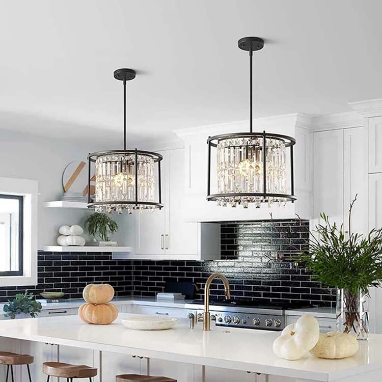 multiple candelabra style bulbs are arranged in a circular pattern within each cylindrical frame