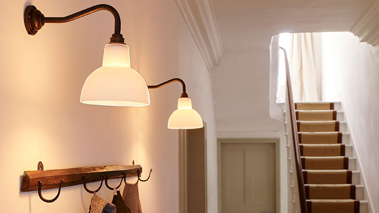 place lights strategically to remove dark spots around entryways and hallways