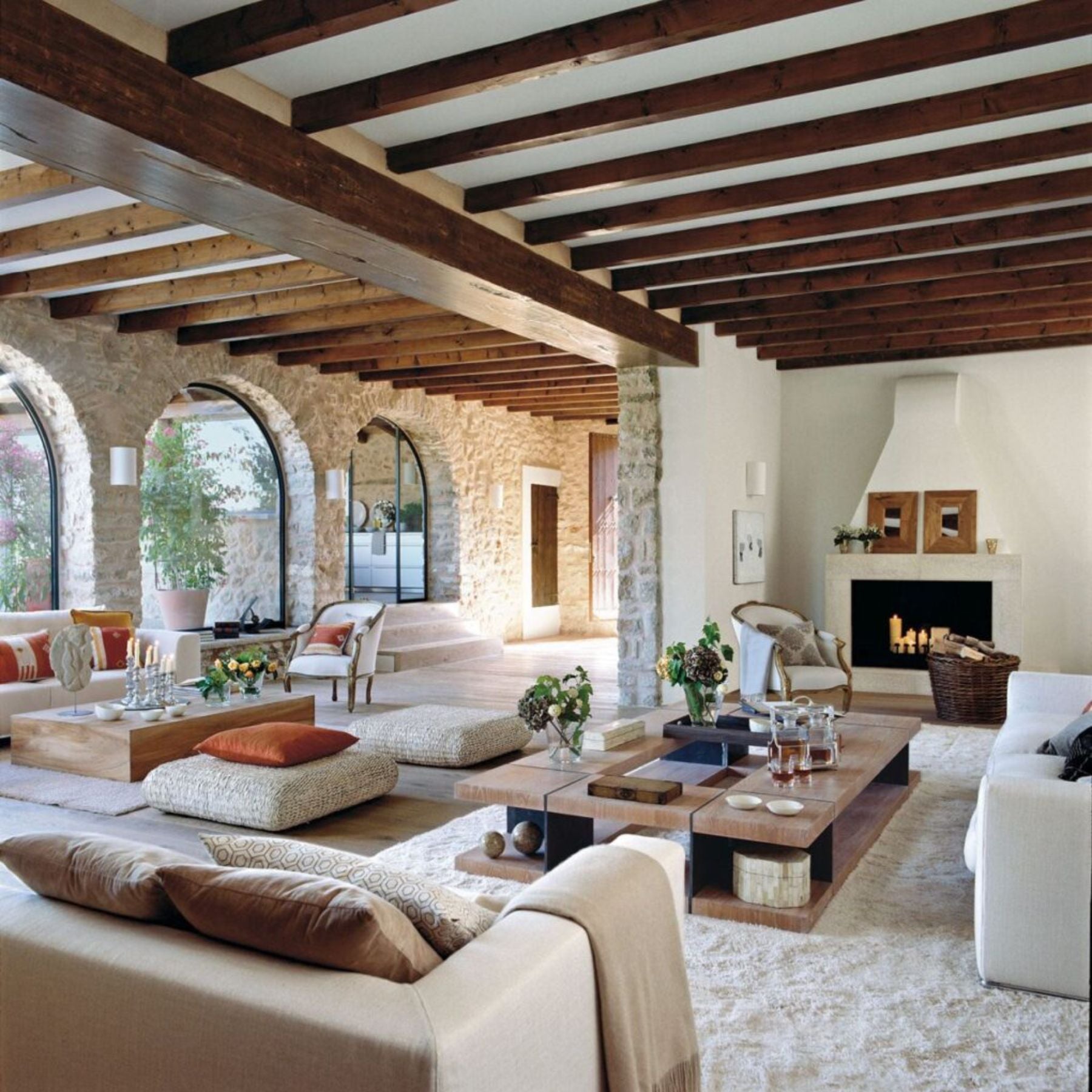 popular architecture with arched doors and windows creates a feeling of openness and connects indoor and outdoor spaces