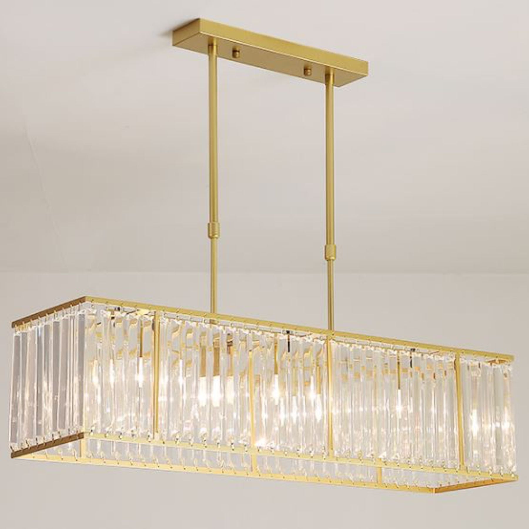 rectangular cascading crystal pendant lights are the perfect addition for those looking for a bright focal point on dining tables and bars