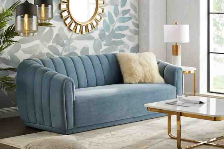 selecting a sofa such as the fabien teal velvet infuses the living space with a plush softness