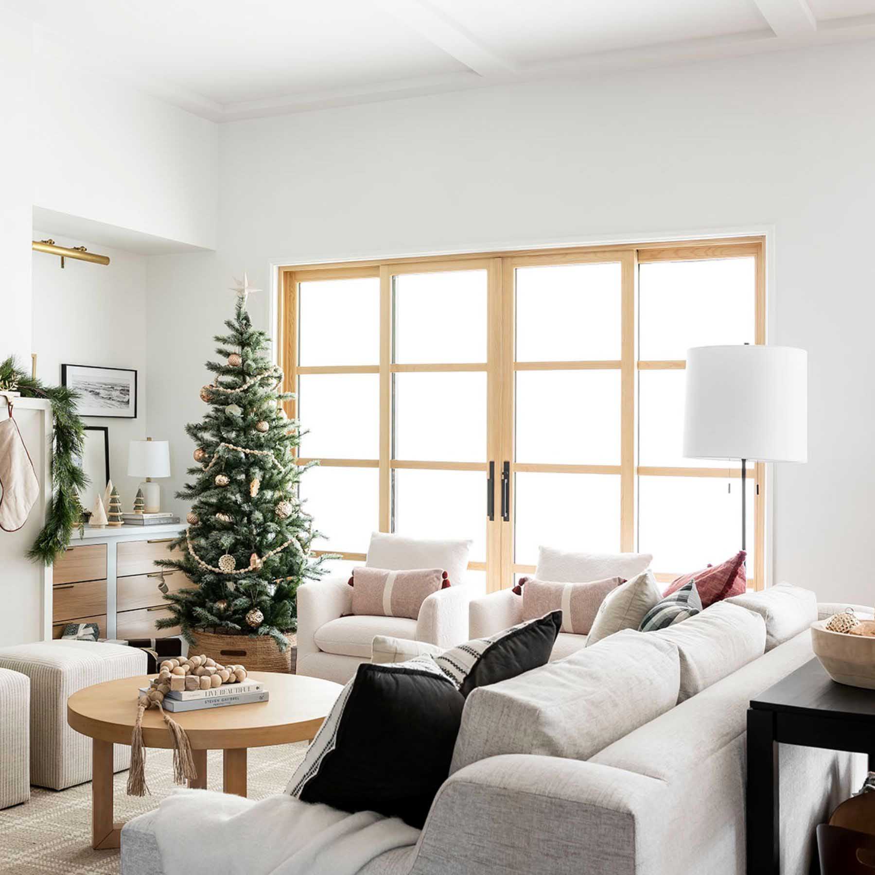 soft neutrals also help accentuate focal points such as the christmas tree or fireplace