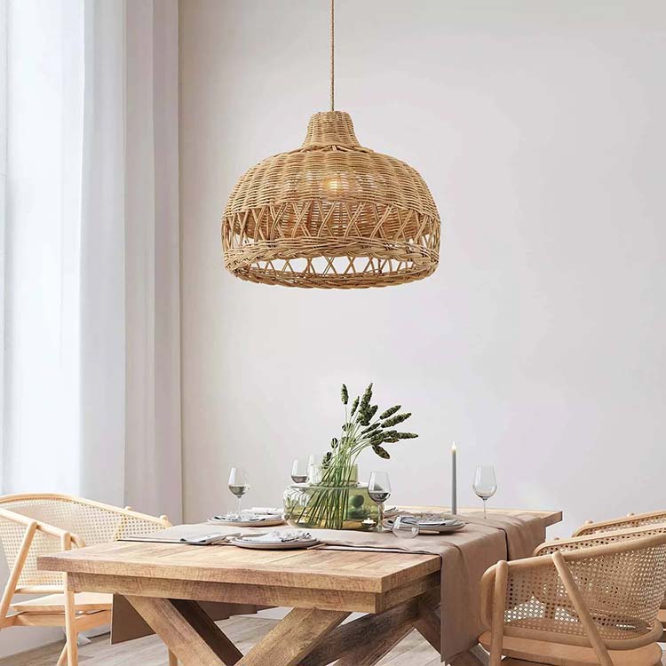the bureau rattan pendant light provides a soft glow in your dining room