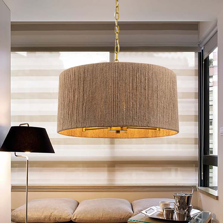 the drum shade chandelier offers classic elegance with a modern twist