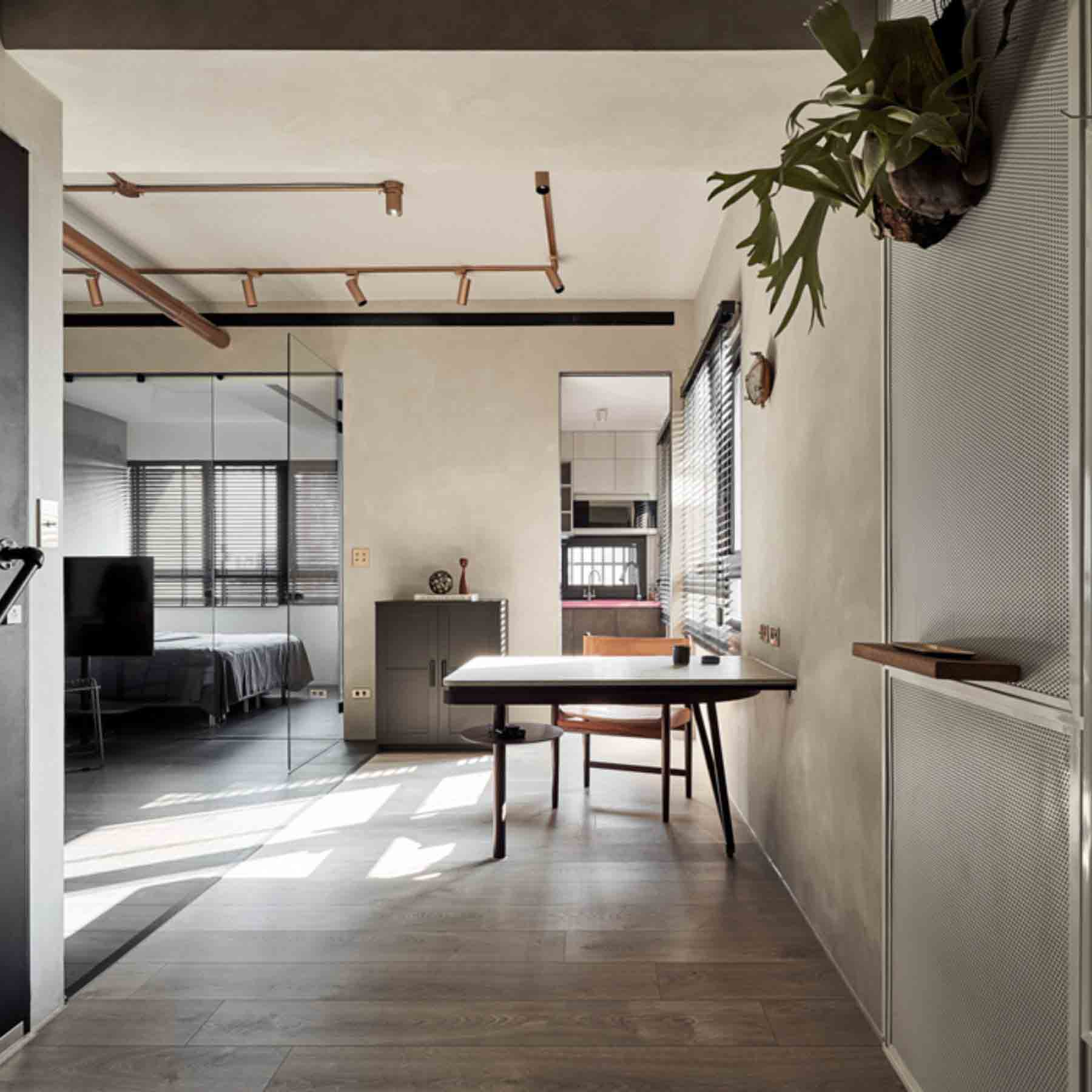 the fusion of minimalism and industrial design results in a contemporary and tranquil ambiance for homeowners