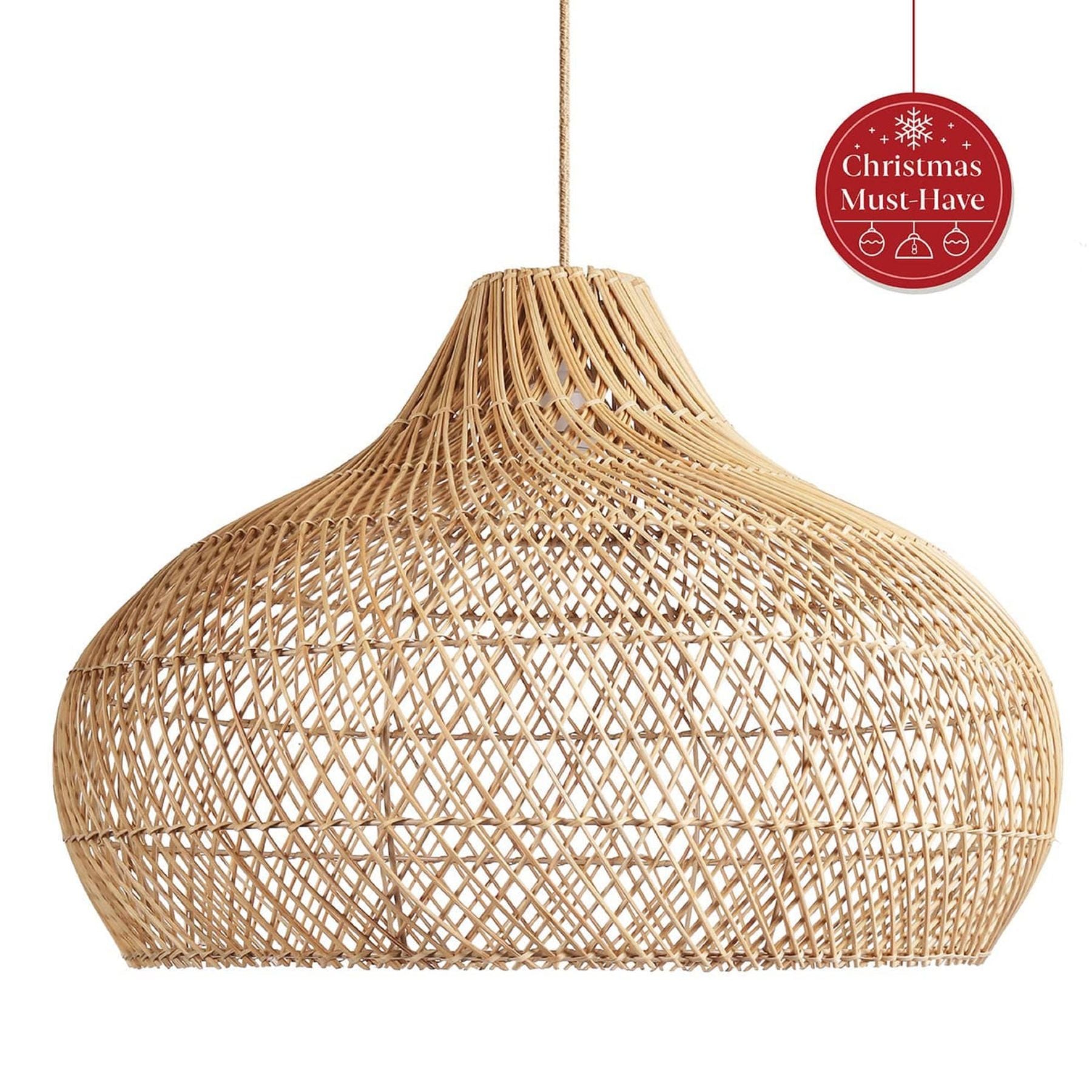 the kloe rattan pendant lamp creates a captivating light that envelops the entire room in a warm and inviting atmosphere