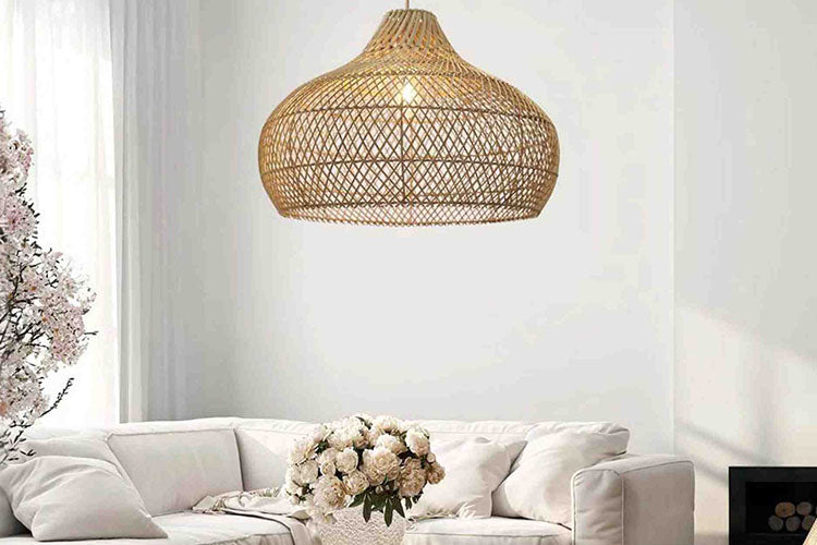 the kloe rattan pendant light beautifully complements wooden furniture