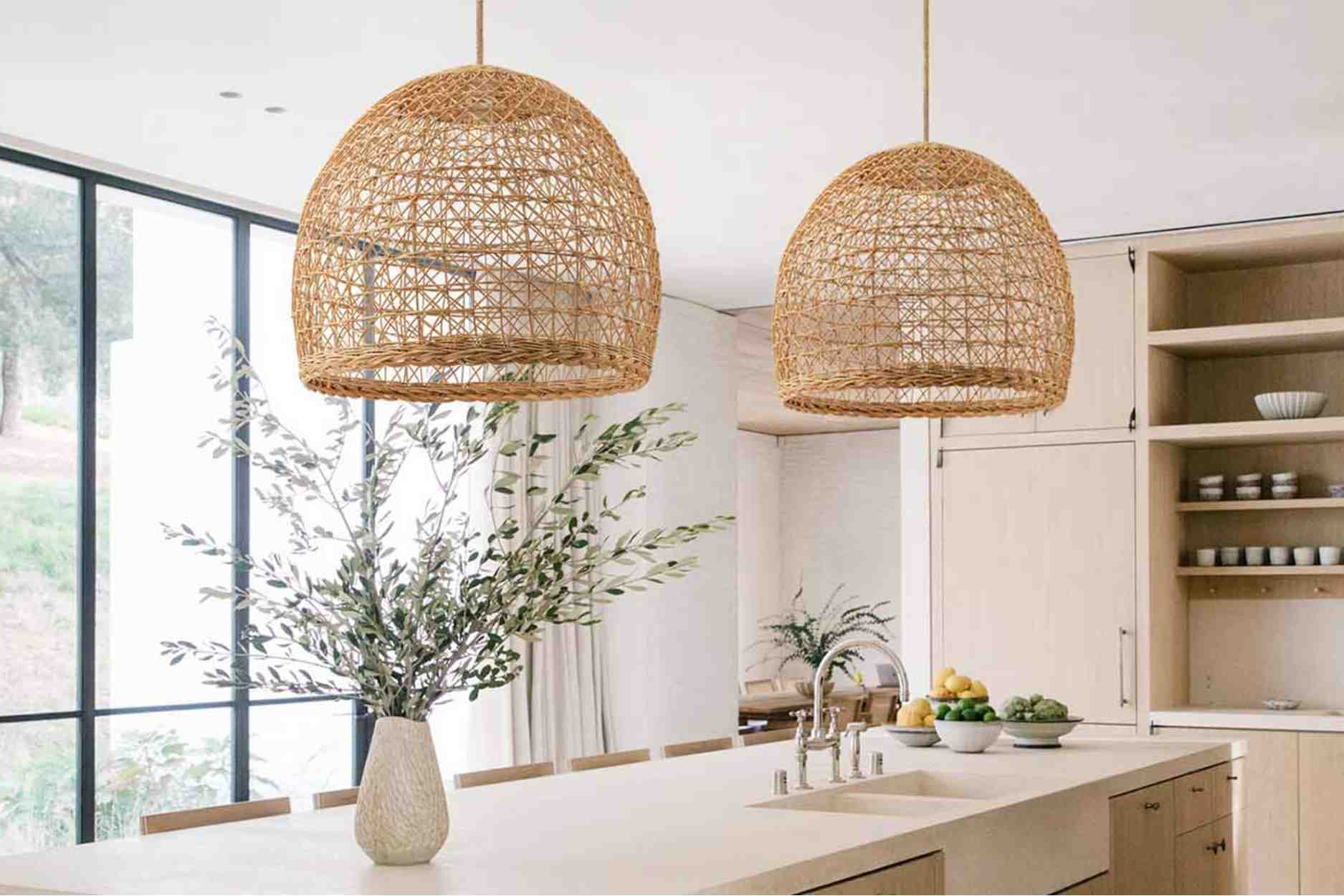 the lumiere bowl rattan pendant light is popular for kitchen islands