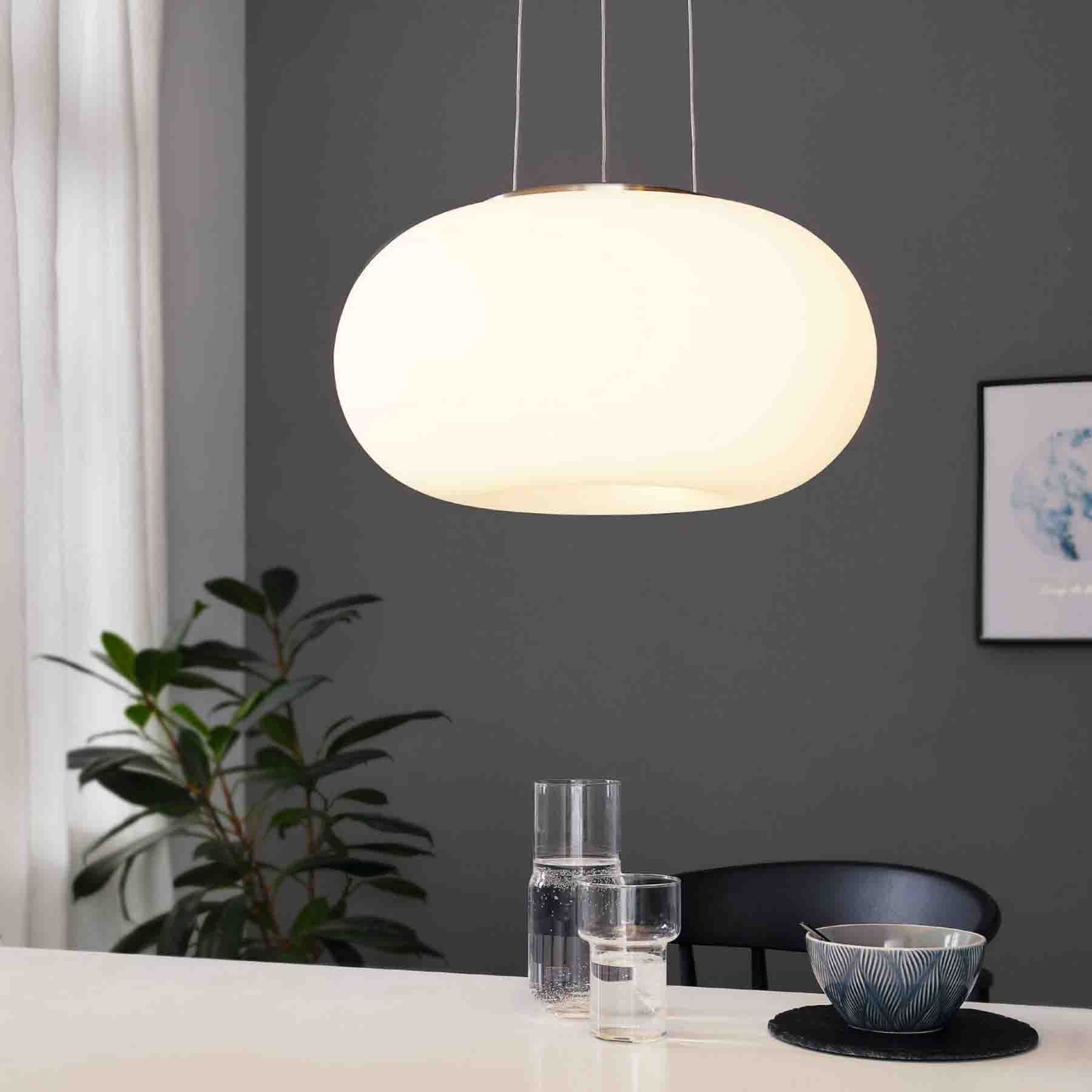 the optica large pendant light is a sleek and impactful addition to the optica collection