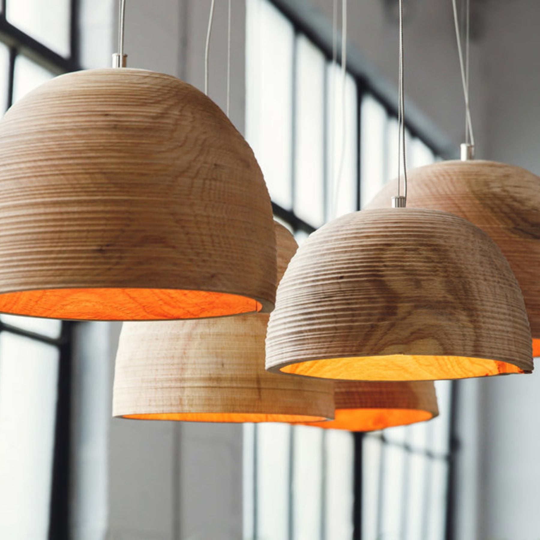 the texture and grain of the wood create a visual richness that adds character to the light