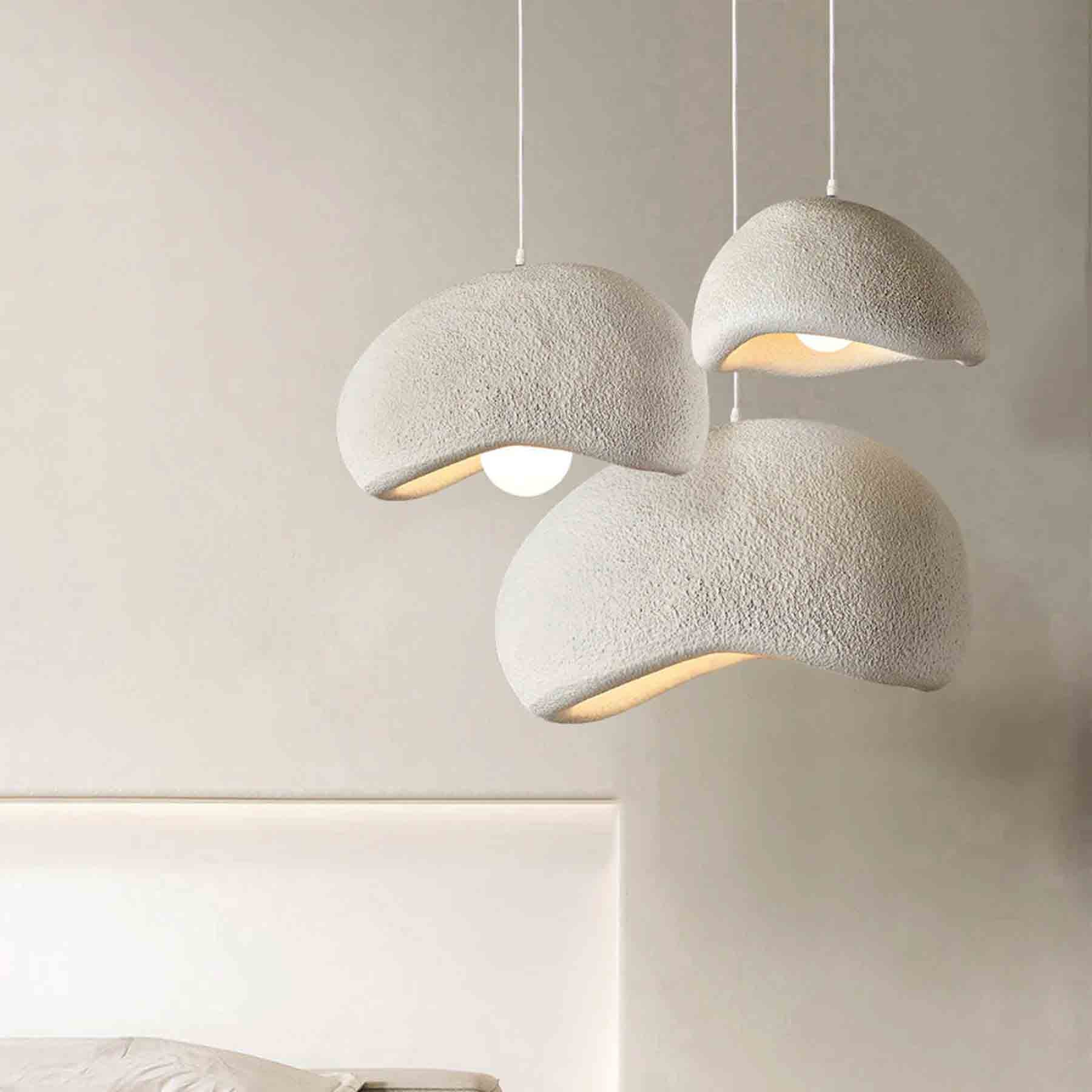 unfinished bowl pendants exude elegance over gilded designs