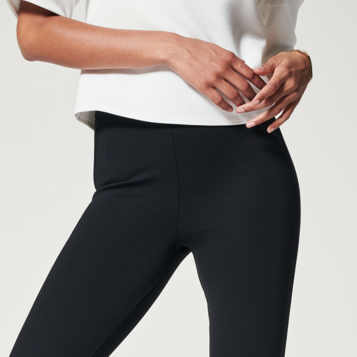ASSETS by SPANX Women's Ponte Shaping Flare Leggings - Black L