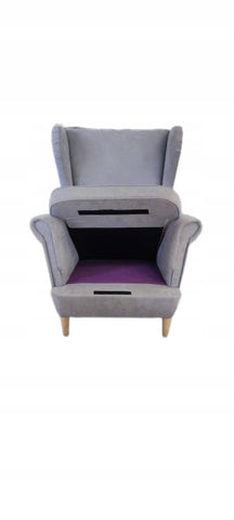 Na zdjęciu widoczne detale siedziska oraz poduszki siedziska w produkcie fotel uszak w stylu skandynawskim