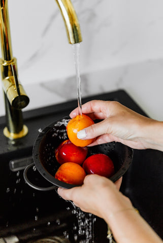 washing peaches for the bbq