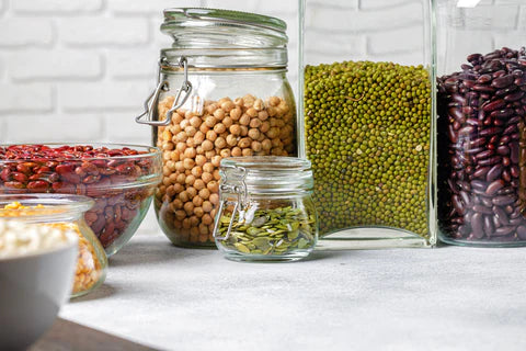 Glass jars filled with beans and legumes