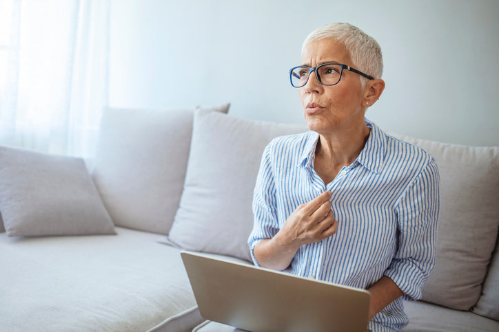 Woman experiencing a hot flash