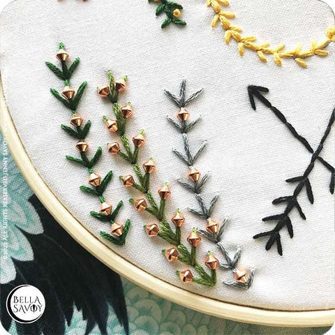 beads added to fern stitches