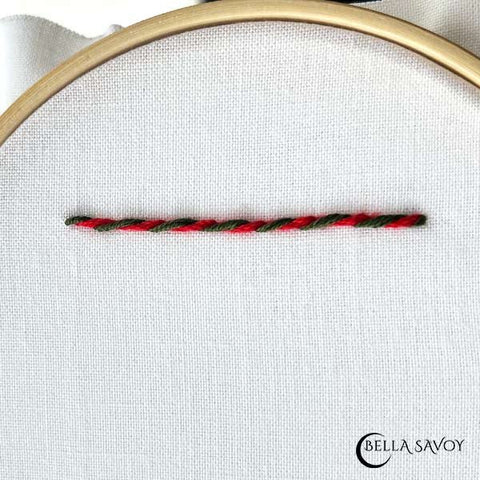 whipped back stitch in red and dark green