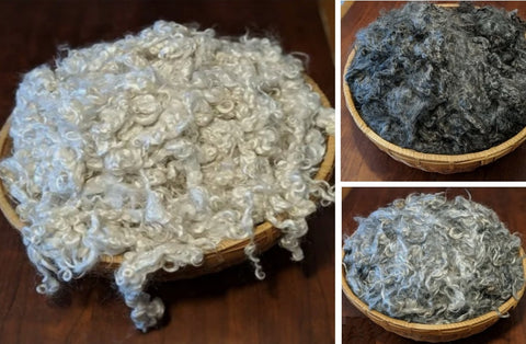 Three baskets displaying washed mohair locks in white, dark and light grey