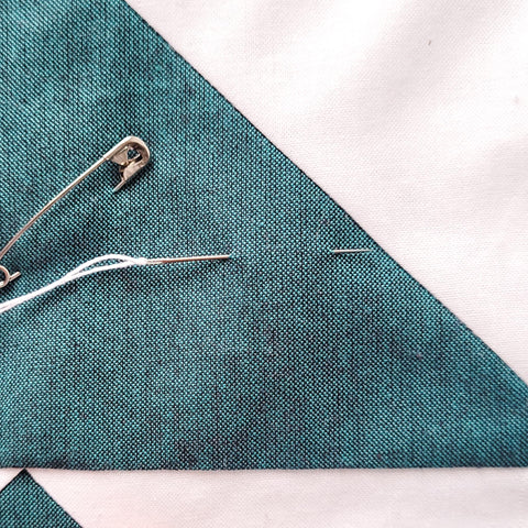 send needle through the top layer only and bring up where you want to start stitching