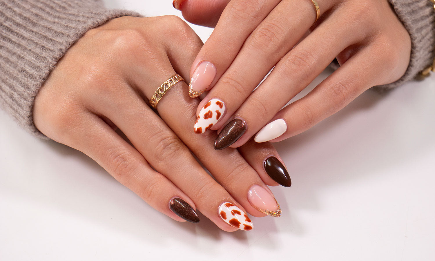 Gelous Cow Print gel nail art - photographed in Australia on model