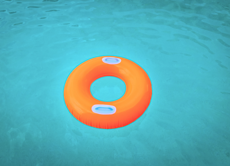 Buoy floating alone in the middle of a pool