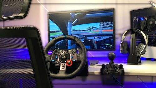 sim+racing+on+a+desk.jpeg__PID:07a0e659-29e0-4ff6-907e-4f13ceb6e83f