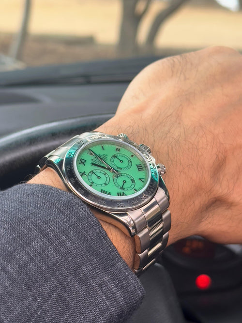 Rolex Daytona Cosmograph Green Beach Dial White Gold Chrysoprase Wrist Shot.jpg__PID:0ecd3aae-03a7-45c9-b270-3b3294ba1c6f