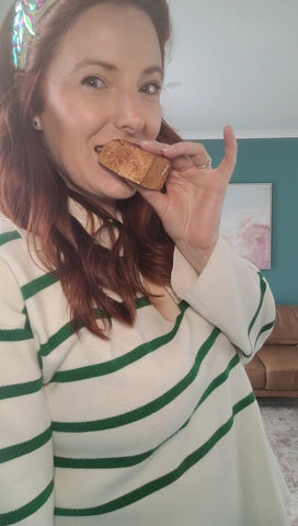 Hella Mallow founder Cherie Donnellan biting into a coffee marshmallow