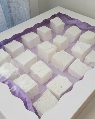 Hella Mallow catering boxes with 20 vanilla bean marshmallows inside.
