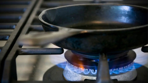 Preheating the cast iron cookware in gas stove