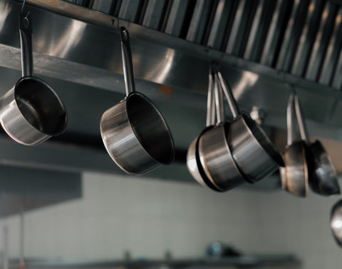 kitchen hanging rack with stainless steel cookware