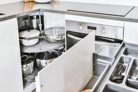 stainless steel kitchenware storage drawers in kitchen