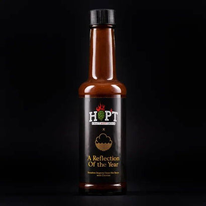 https://cdn.shopify.com/s/files/1/0630/8111/9982/products/a-reflection-of-the-year-150ml-hopt-sauce-cherry-chocolate-hot-sauce-hopt-sauce-188243.webp?v=1701636032&width=410