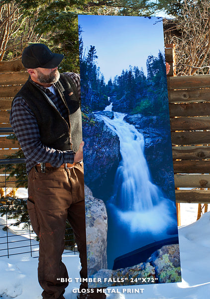 Craig Hergert holding large metal print