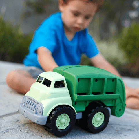Boy playing with Green Toys Recycle Truck