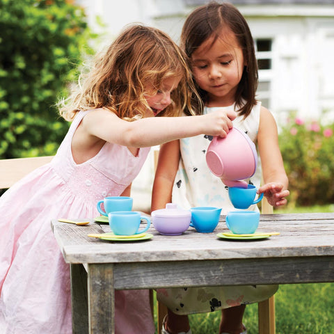 Girls playing with Green Toys Pink Tea Set