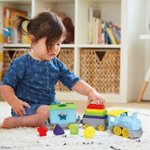 Eco baby toys: Girl playing with Green Toys Stack & Sort Train
