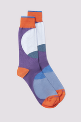 Duchamp has a history of producing premium boldly patterned socks. This pair of socks features luxury elevated quality cotton blend yarns, designed for exceptional comfort and made in Italy. This design is complete with a large multi-coloured circle pattern, finished with the Duchamp logo.