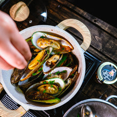 One pot, mussels white wine and kam heong twist to a classic dish with Kopi Thyme.