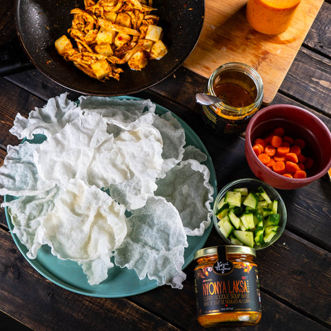 Ingredients to make rice paper nacho with chicken, tofu, Kopi Thyme Nyonya Laksa, carrot and cucumber for toppings