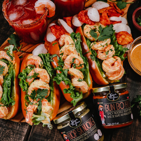 caesar with zesty shrimp roll and kopi thyme jars