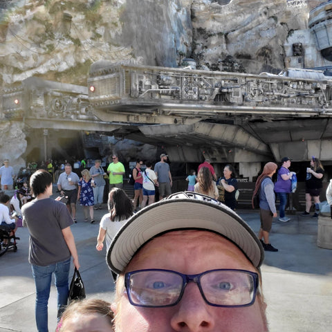 Me at Galaxy's Edge in front of the Millennium Falcon