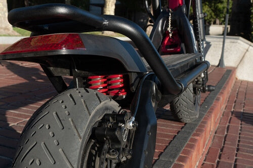 Close up of rear suspension on the Kaabo Wolf electric scooter