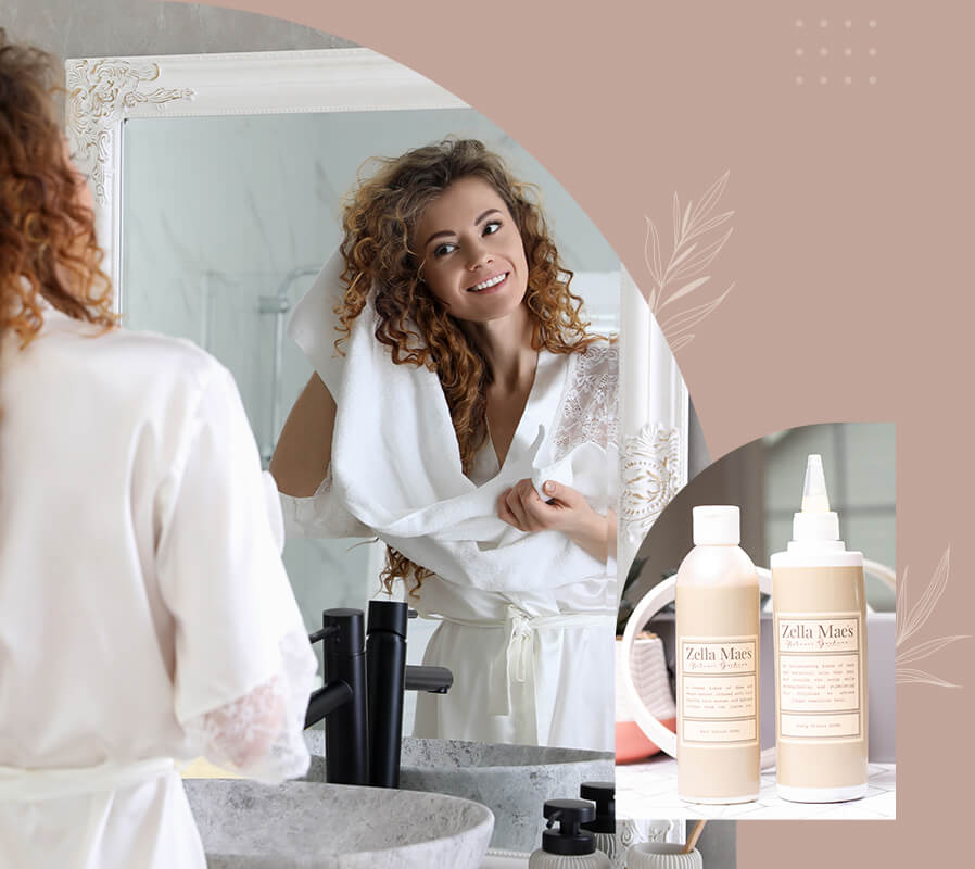 Woman drying her hair with towel