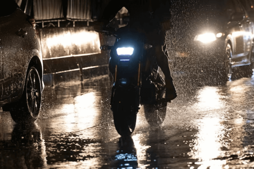 Ebike moving in dark and rainy night